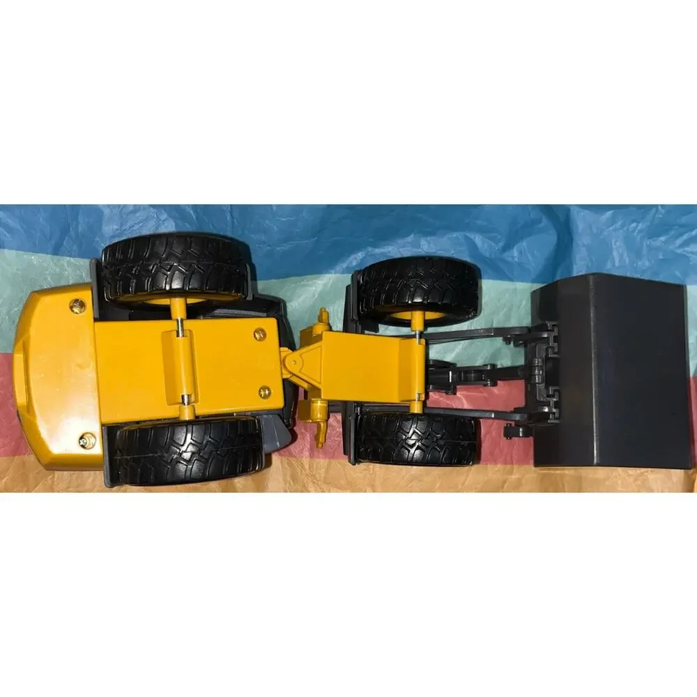VOLVO ELECTRIC L25 FRONT END LOADER LOOSE PLASTIC NEW RAY NR1 ARTICULATED SCOOP.